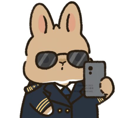 卡通小兔子拿手机自拍头像图片